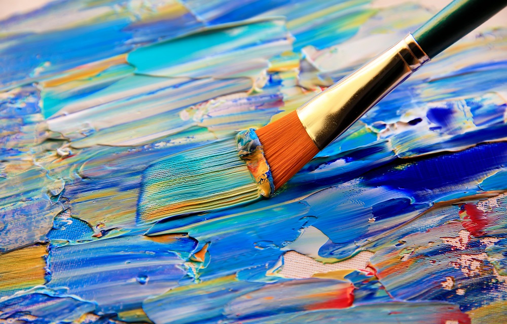 Brush applies paint
