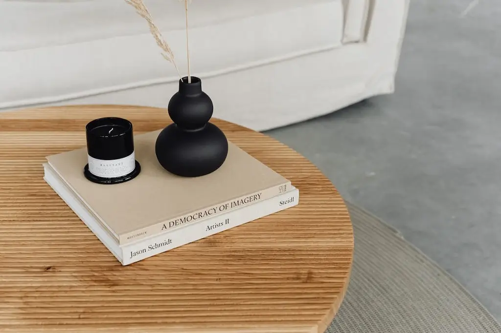coffee table home decoration design with candles and vases